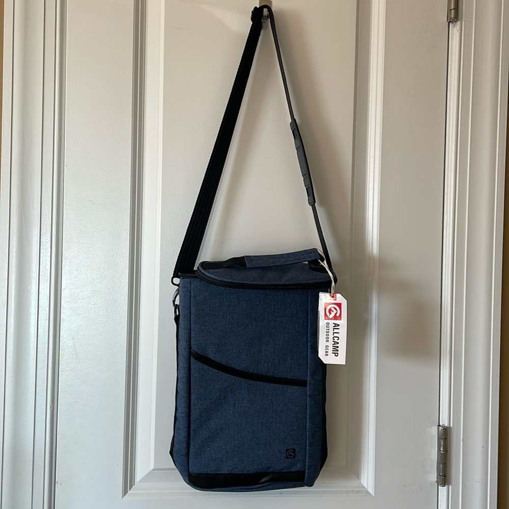 All camp outdoor gear bag with pocket knife.
